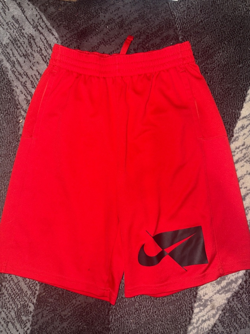 Nike Red Shorts with Black Swoosh Patch